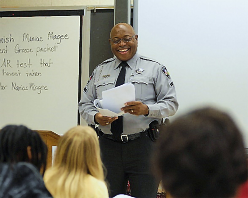 Photo of Deputy Charles Peele of the Harnett County, NC, Sheriff’s Office leads a class taking the G.R.E.A.T. program. 